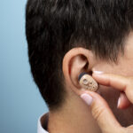 Summer Travel and Your Hearing Aids: What to Know This July